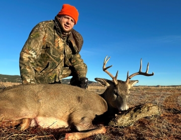 Wyoming hunter with his 4x4 whitetail deer